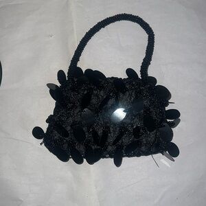 Ladies small even beaded bag. Has beaded wrist handle! Great condition!